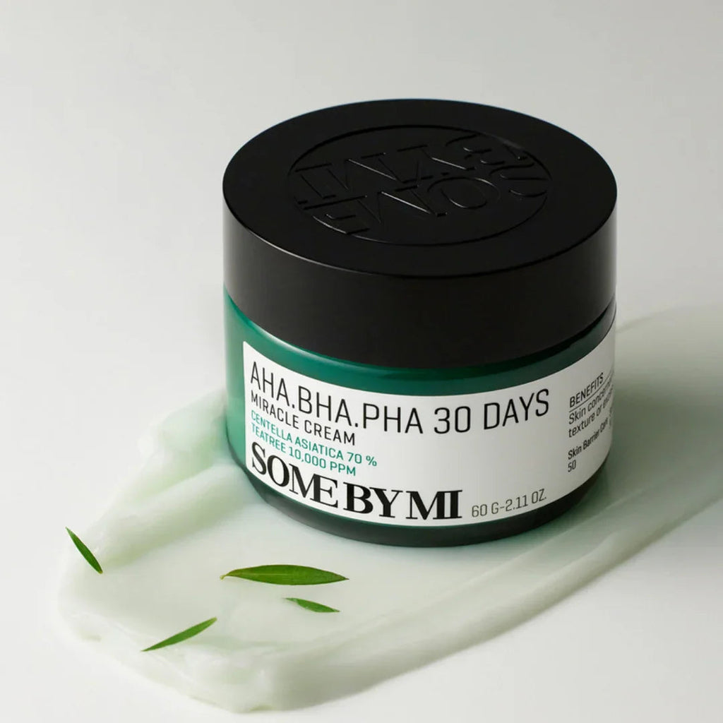 SOME BY MI AHA BHA PHA 30 Days Miracle Cream jar with Centella Asiatica and tea tree on white surface