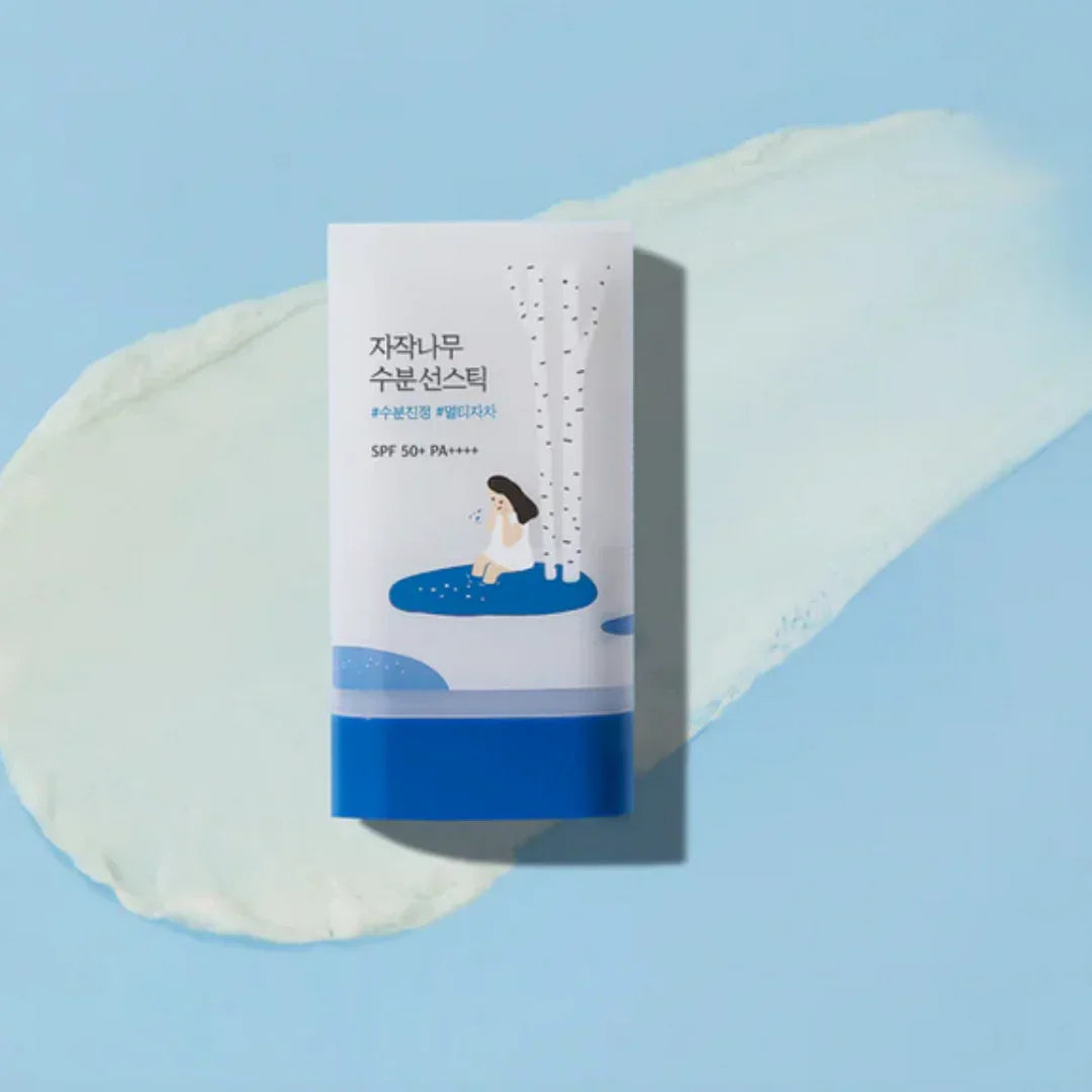 Korean Birch Moisturizing Sun Stick SPF 50+ PA++++ skincare product with blue and white packaging on light blue background