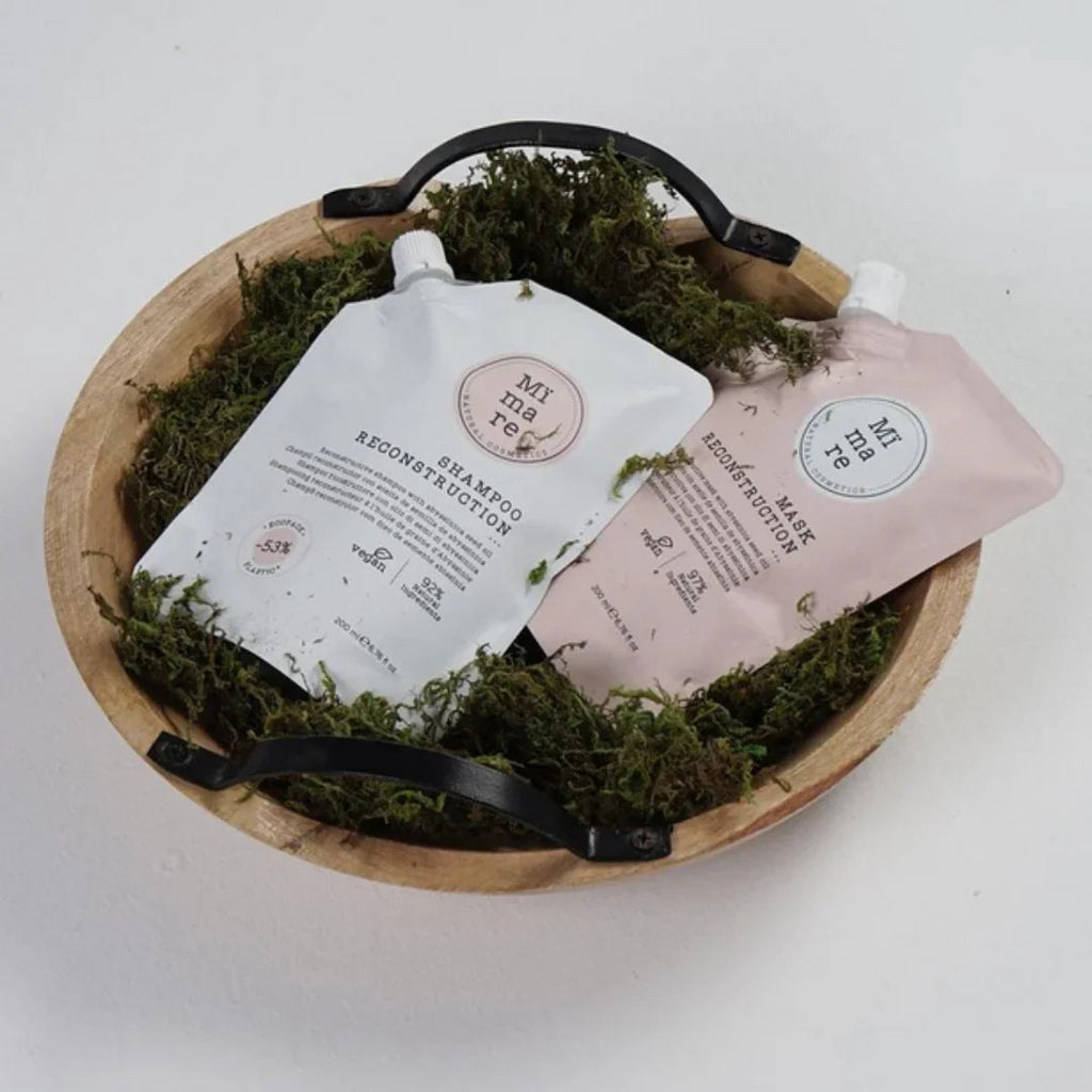 Mi nare natural cosmetic shampoo and mask reconstruction pouches in wooden bowl with greenery, K-Beauty hair care