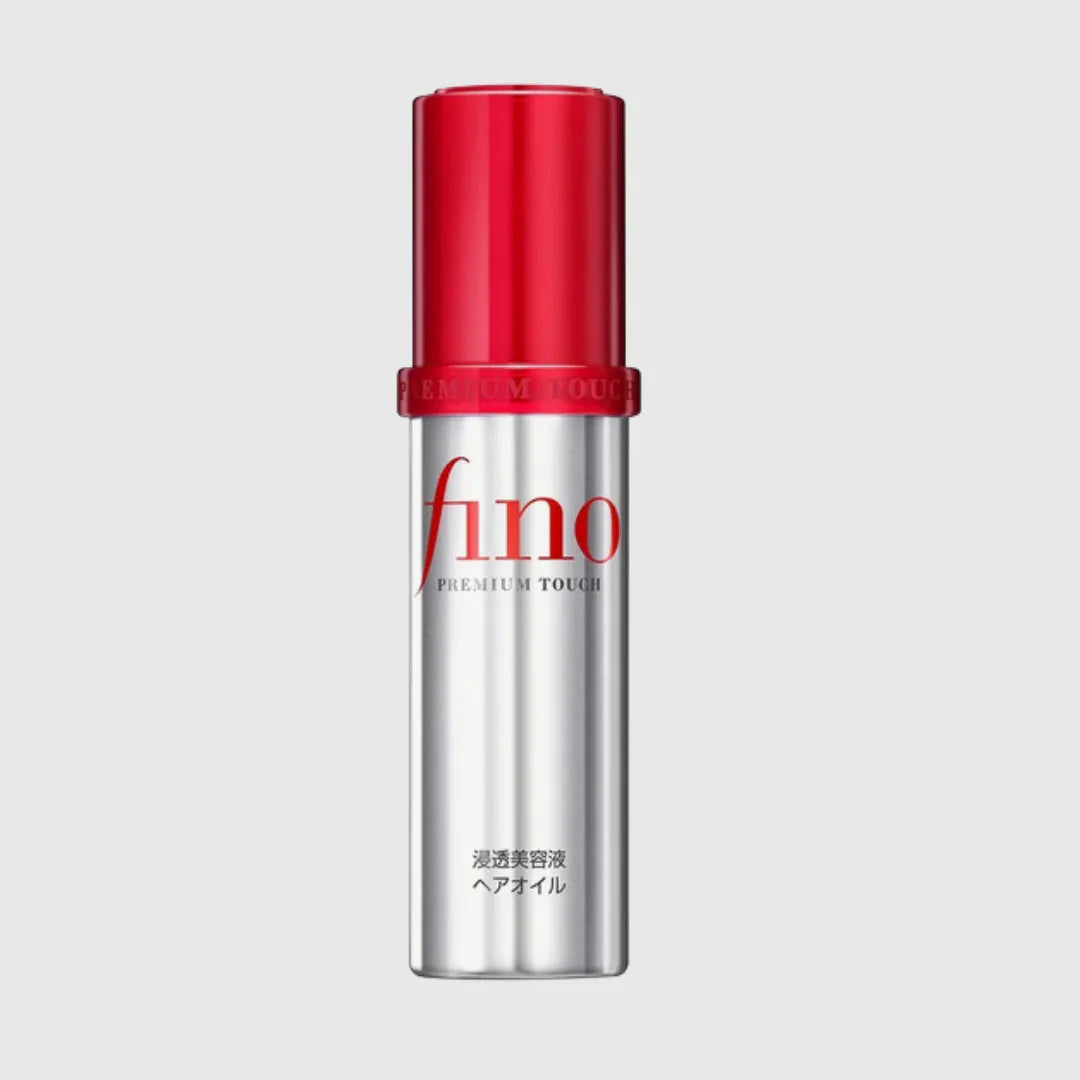 Fino Premium Touch hair oil in silver bottle with red cap, Korean hair care product